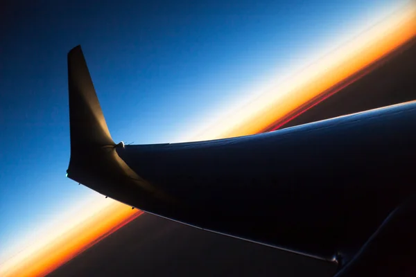 Wing aircraft at sunset — Stock Photo, Image