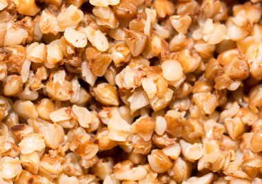 karabuğday kabuğu çıkarılmış tane arka plan olarak. Kapat