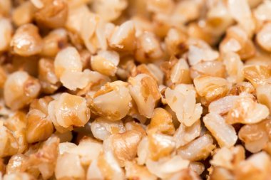 karabuğday kabuğu çıkarılmış tane arka plan olarak. Kapat