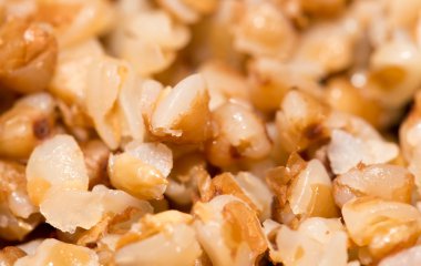 karabuğday kabuğu çıkarılmış tane arka plan olarak. Kapat