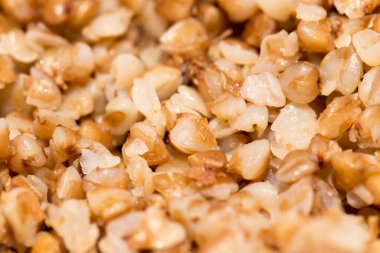 karabuğday kabuğu çıkarılmış tane arka plan olarak. Kapat