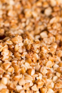 karabuğday kabuğu çıkarılmış tane arka plan olarak. Kapat