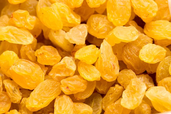 Golden raisins secs fond gros plan — Photo