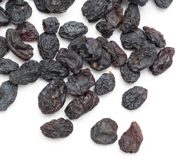 Black raisins as background. macro — Stock Photo, Image