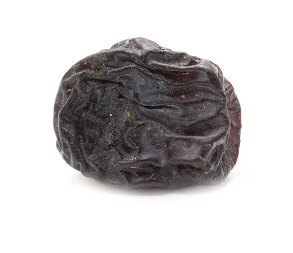 Black raisins as background. macro — Stock Photo, Image