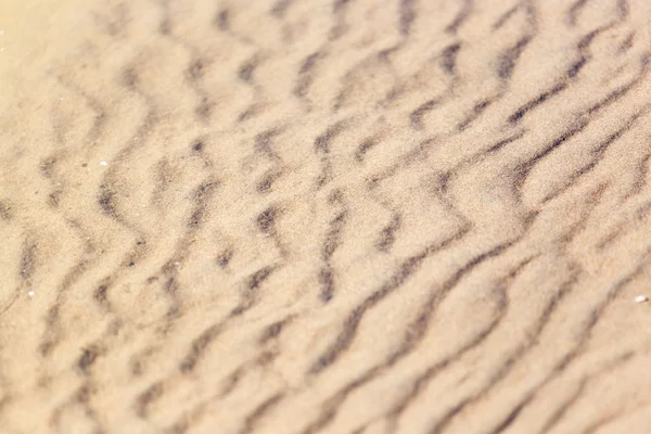 Areia sob a água na natureza como fundo — Fotografia de Stock