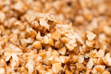 karabuğday kabuğu çıkarılmış tane arka plan olarak. Kapat