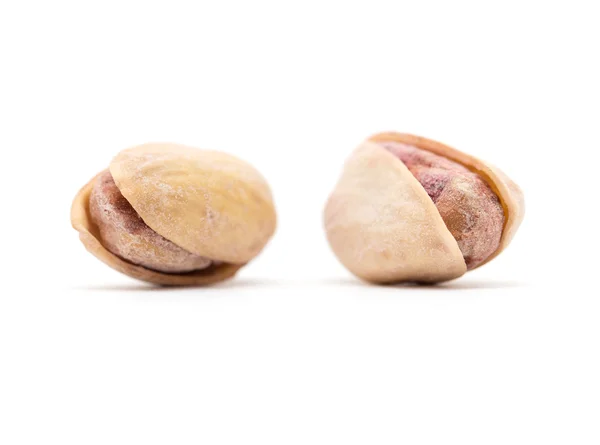 Pimpernoten (pistaches) als achtergrond. sluiten — Stockfoto