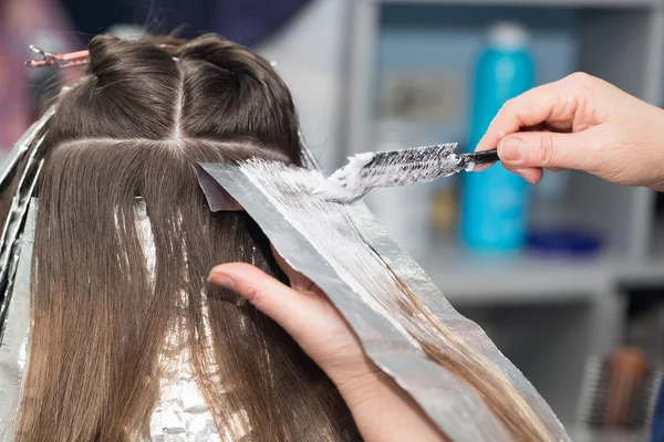 weave hair in a beauty salon