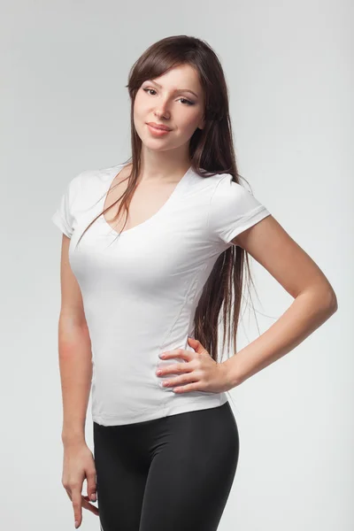 Fitness nő a sport stílus álló fehér háttérrel. elszigetelt — Stock Fotó