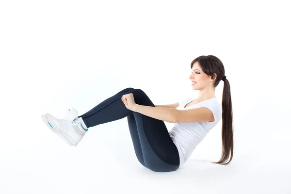 Mulher fitness fazendo exercício de ginástica — Fotografia de Stock