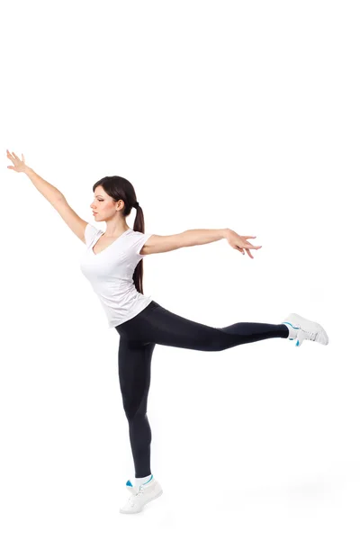 Mujer bastante moderna saltando bailando aislada sobre un fondo de estudio blanco — Foto de Stock