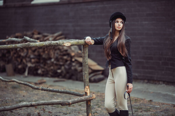 Woman in Riding School