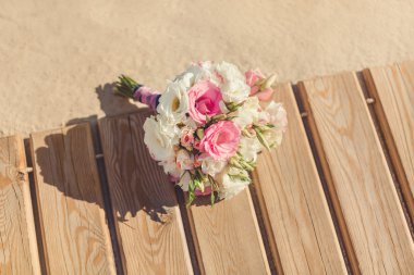Brides Bouquet on Tropical Beach clipart