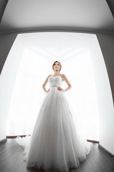 Brides beauty. Young woman in wedding dress indoors — Stock Photo, Image