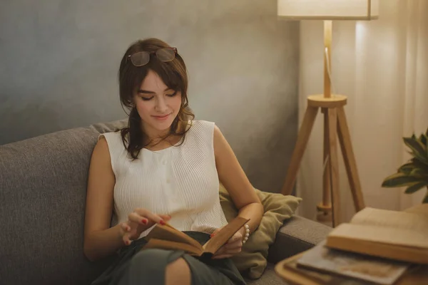 Young Woman Reading a Book at Home — Stock Photo, Image