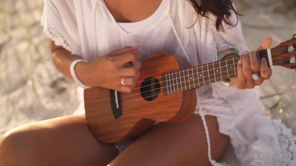 Woman With Ukulele During Summer Beach Vacation Near the Sea — Stock Video