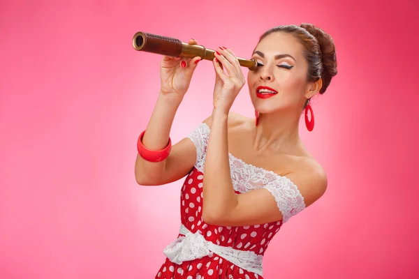 Happy Woman Holding Telescope. Pin-Up Retro style. — Stock Photo, Image