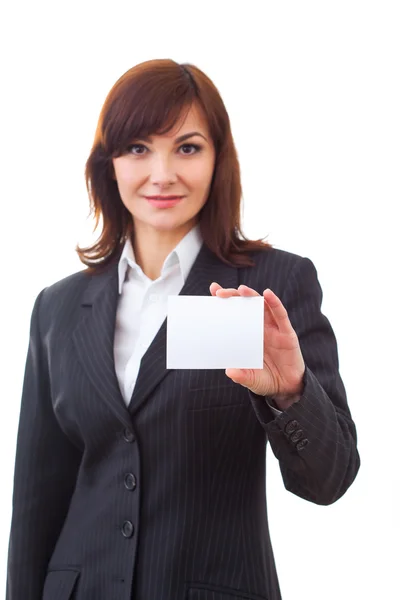 Happy beautiful businesswoman holding a blank card — Stock Photo, Image