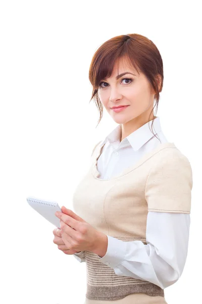 Mujer mayor escribiendo notas, sonriendo y mirando a la cámara. Aislado sobre fondo blanco . —  Fotos de Stock