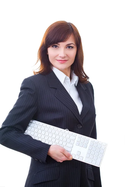 Vrouw in pak met toetsenbord van de computer — Stockfoto