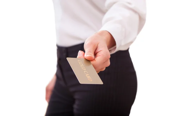 Businesswoman holding a gold card Stock Photo