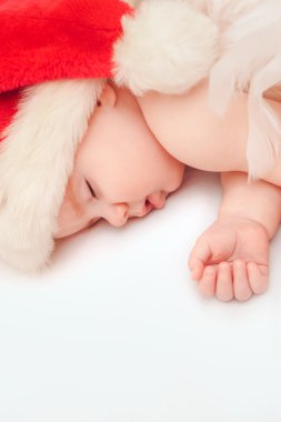 Küçük çocuk yeni yıl şapkası uyku