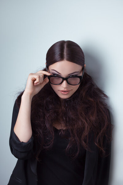 Beauty shot of a woman in stylish shades.