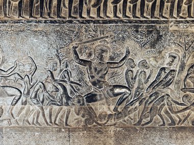 Angkor Wat bas-avuntusu dramatik bir Khmer efsanesi savaşı gösteriyor. Süslü sınırların altında kumtaşına oyulmuş savaşçılar. Konsept, editörlük eğitimi, müzeler ve seyahat için yüksek kaliteli kültürel imaj