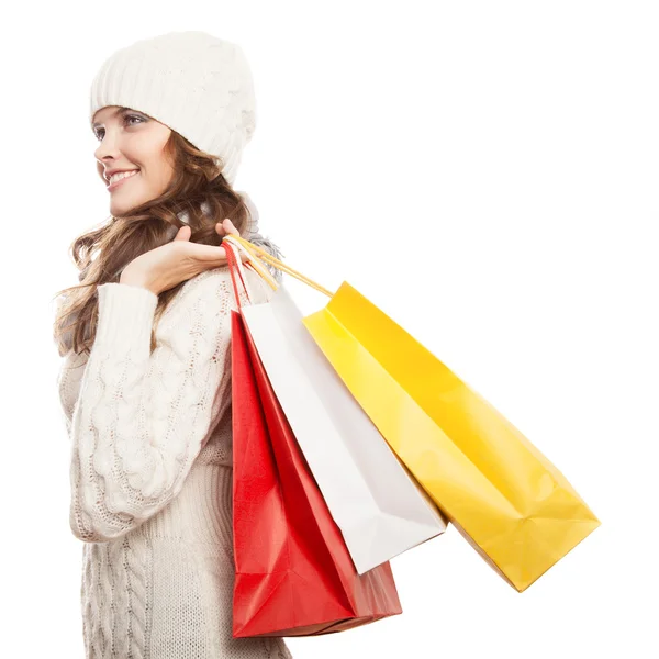 Compras mujer feliz sosteniendo bolsas. Ventas de invierno . —  Fotos de Stock