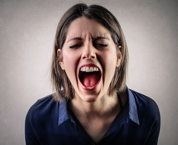 Portrait of woman screaming