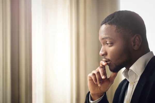 Businessman thinking about something — Stock Photo, Image