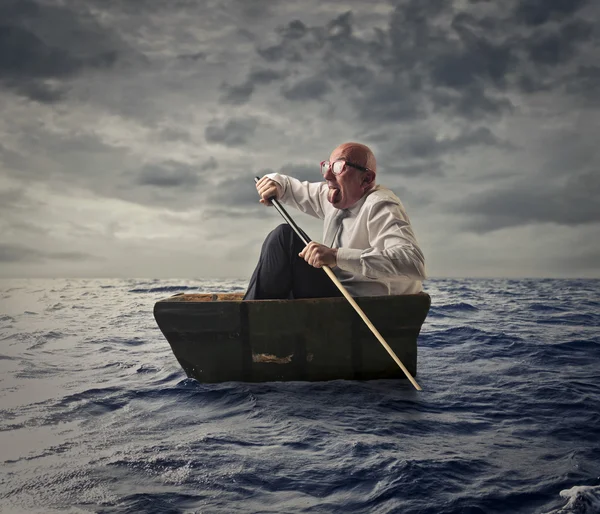 Man in een boot — Stockfoto