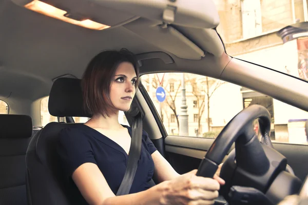 Woman in a car — Stock Photo, Image