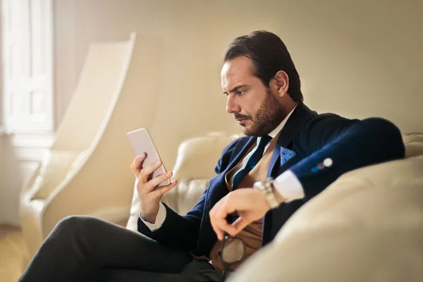 Businessman using phone — Stock Photo, Image