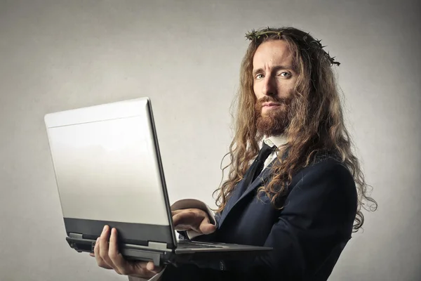 Jesus Cristo com o computador — Fotografia de Stock