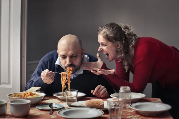 Couple eating and arguing — Stock Photo, Image
