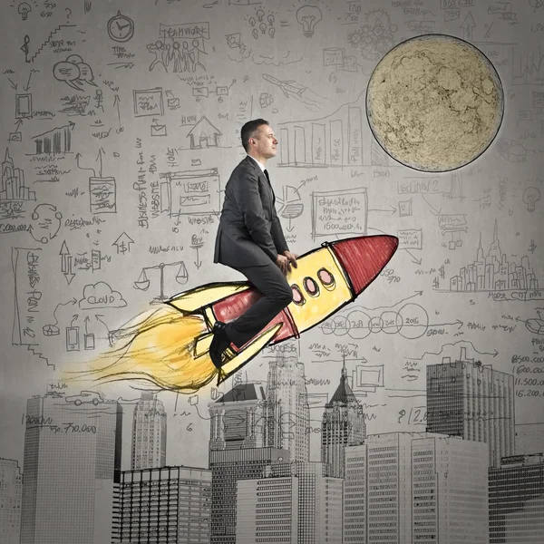 Businessman in a rocket — Stock Photo, Image