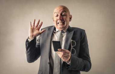 Telefon ile karışık iş adamı