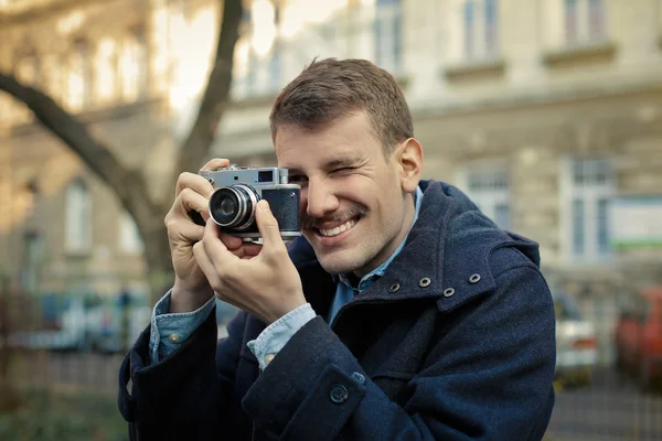 Fotograf med kamera — Stockfoto