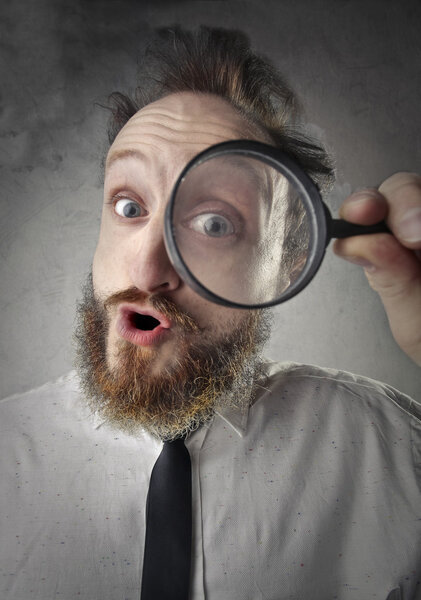 Man with magnifying glass