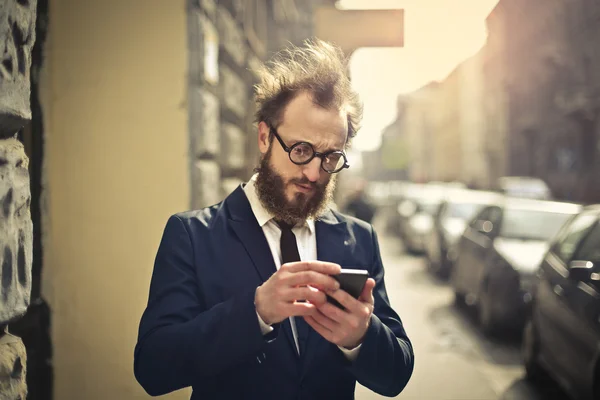 Homme d'affaires avec téléphone — Photo