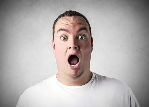 Surprised man looking scared — Stock Photo, Image