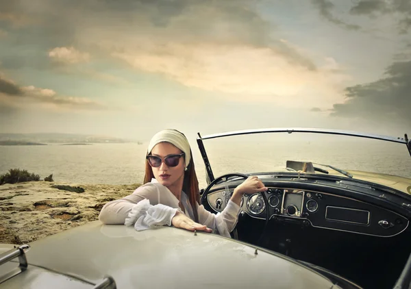 Elegant woman in an elegant car — Stock Photo, Image