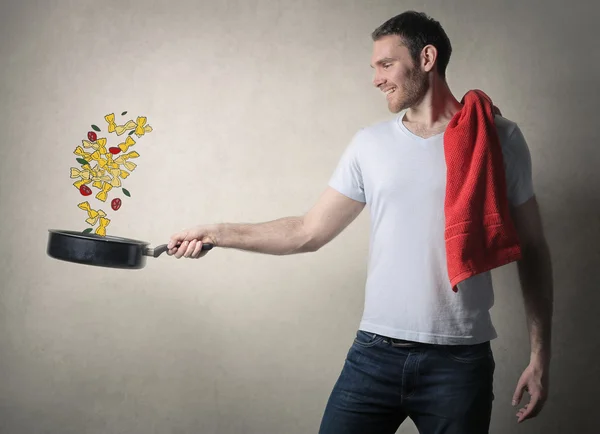 Adam yukarı okmaken van pasta — Stockfoto