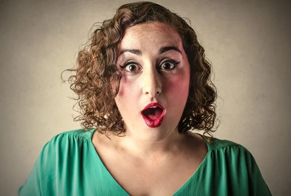 Shocked woman with a chubby face — Stock Photo, Image