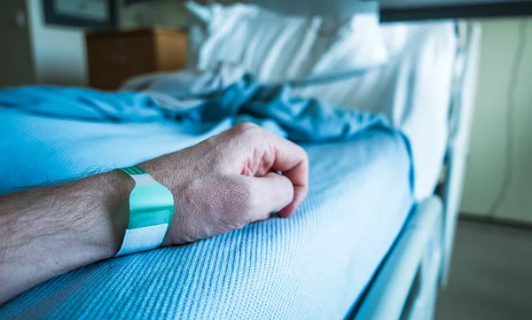 Hospital Patient Arm With Wrist Tag — Stock Photo, Image
