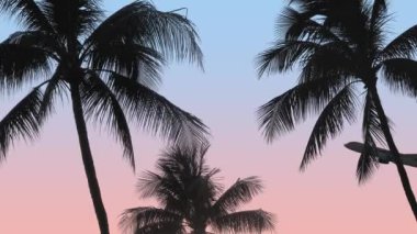 Hawaii 'deki güzel tropikal palmiye ağaçlarının arkasından kalkan bir uçak.