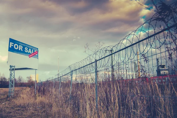 Para venda Sign On Urban Wasteland — Fotografia de Stock