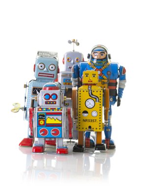 Retro teneke Clockwork robotlar beyaz bir arka plan üzerinde topluluğu